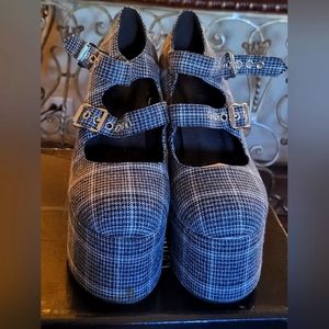 Size 9 grey and black checker platform heels.